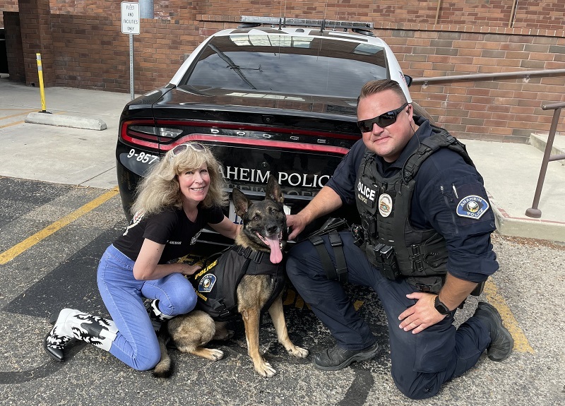 Hugs from K9 Armor cofounder Suzanne, and Anaheim Police K9 Leo and Officer Brett Klevos