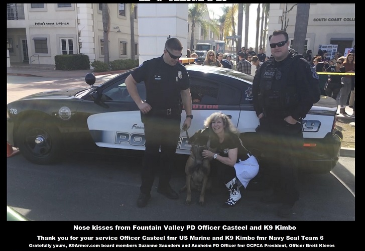 Nose kisses for K9 Armor cofounder Suzanne from Fountain Valley PD  K9 Kimbo, former Navy Seal Team 6 K9 and Officer Casteel, presented with K9 Armor board member Anaheim PD Officer Brett Klevos