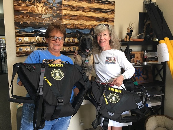 Hugs from Susan Forbes owner of K9 Tactical Gear with K9 Yeti and K9 Armor cofounder Suzanne Saunders