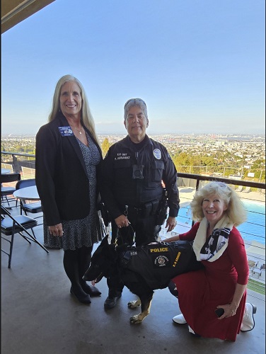 San Pedro Elks Lodge 966 Exalted Ruler Dr. Kim White hosting a K9 Armor presentation by cofounder Suzanne Saunders to LA Port Police Officer Hernandez for her partner K9 Emir