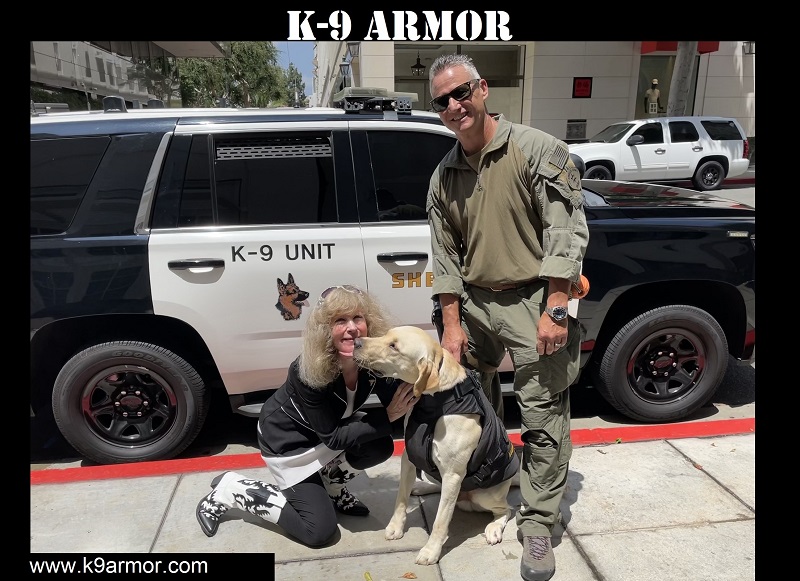 K9 kisses from K9 Armor cofounder Suzanne and LA Sheriff K9 Bear with Deputy Mayberry