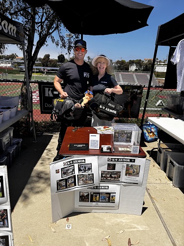 El Segundo Police Oficer Brian Slover and K9 Armor cofounder Suzanne Saunders, rundraising at the LA County Police K9 Show 2024 to give a bulletproof vest for his partner Xena