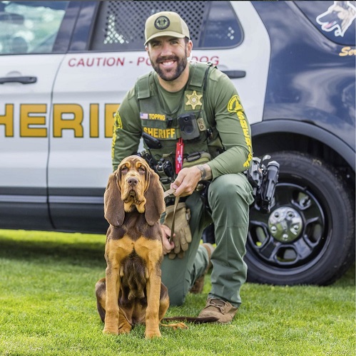 Smiles from Riverside County Sheriff Deputy Topping with his partner K9 Leia