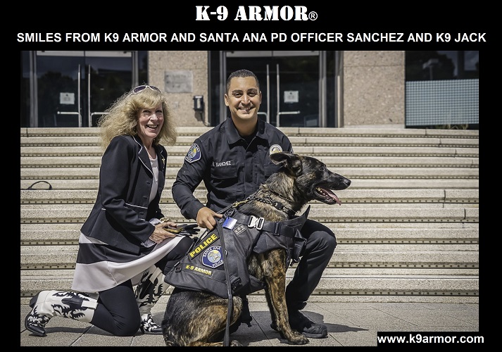 Smiles from K9 Armor cofounder Suzanne Saunders and Santa Ana PD Officer Sanchez and K9 Jack wearing his K9 Armor vest