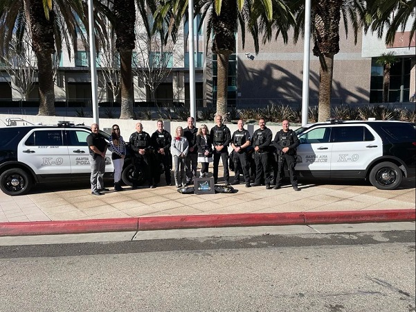 Santa Ana Police ceremony for K-9 Armor thank you sponsors Christine Mantyla of South Coast College and friends Mike and Krista Pennington December 15, 2021