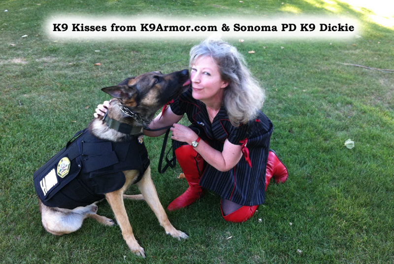 Sonoma PD K9 Dickie gives k9 kisses to K-9 Armor co-founder Suzanne Saunders