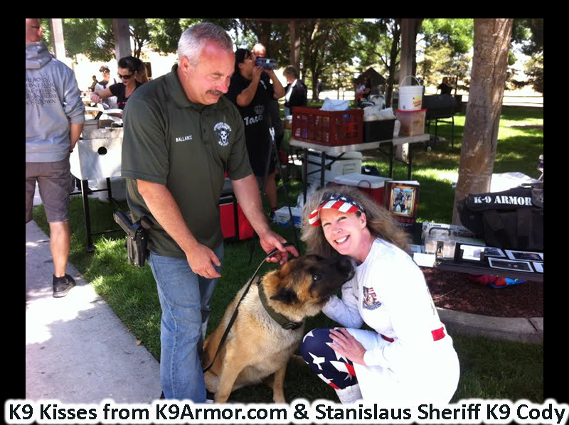 K9 Kisses from Stanislaus County Sheriff K9 Cody to K9 Armor cofounder Suzanne Saunders. 