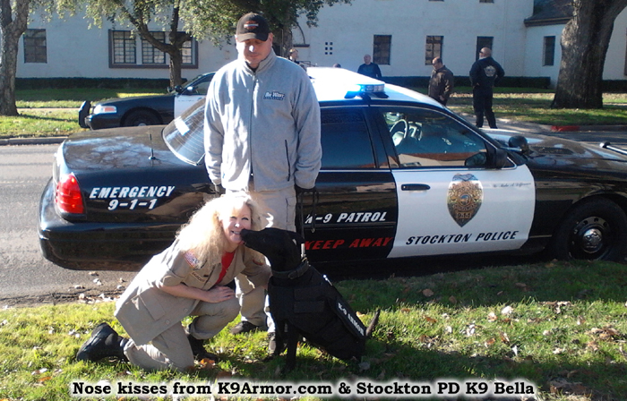 Stockton PD K9 Bella gives kisses to Suzanne Saunders, K-9 Armor Co-Founder